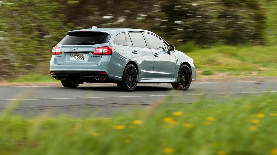 2019 Subaru Levorg GT-S driving past trees