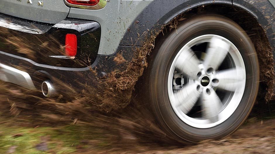2017 Mini Countryman Cooper S wheels kicking up mud