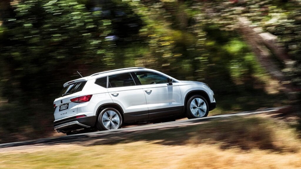 2017 Seat Ateca Xcellence 4Drive driving past trees