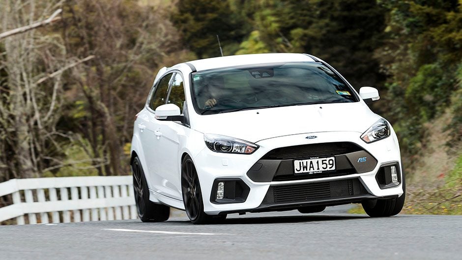 Ford Focus RS lifting a rear wheel through corner