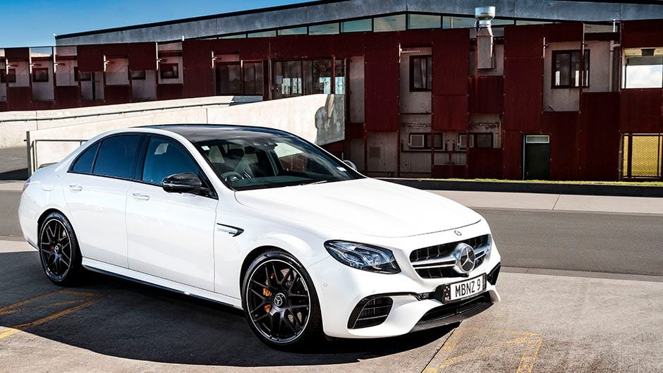 2017 Mercedes-AMG E 63 S 4MATIC+ front static in front of rusty building