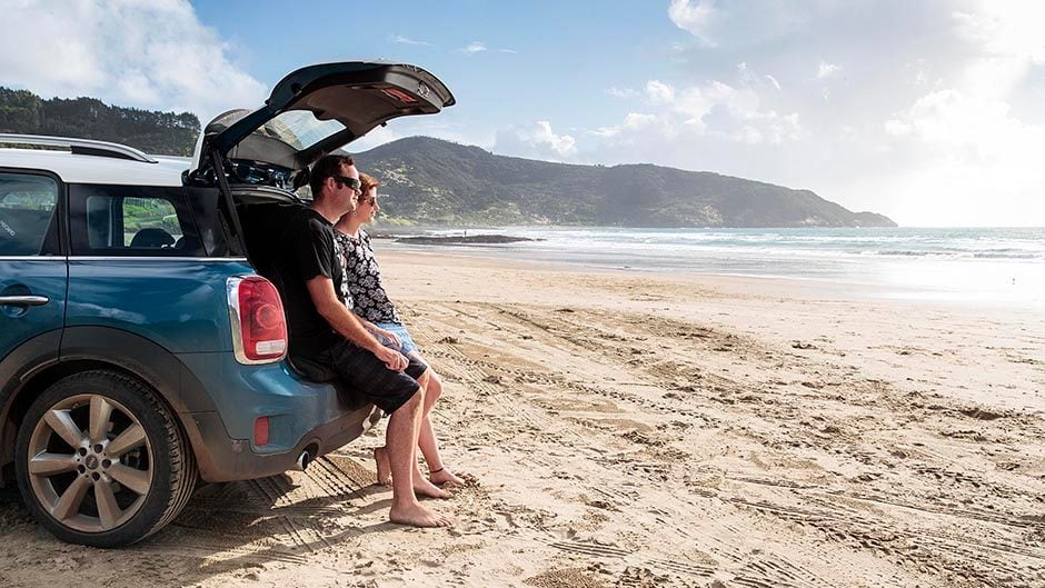 2017 Mini Cooper S Countryman couple sat on tailgate on beach