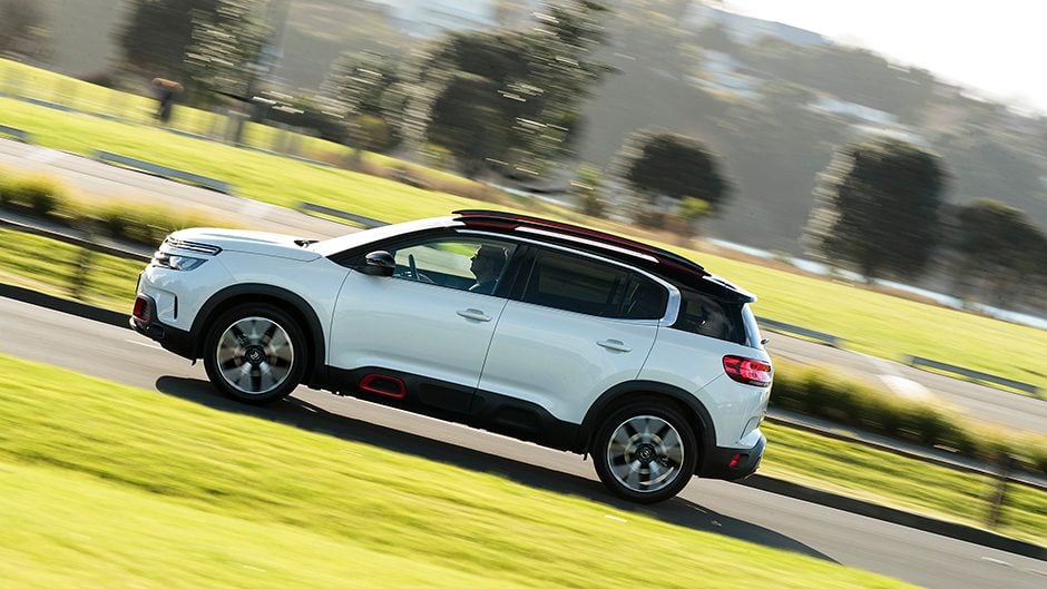 2019 Citroen C5 Aircross driving past trees