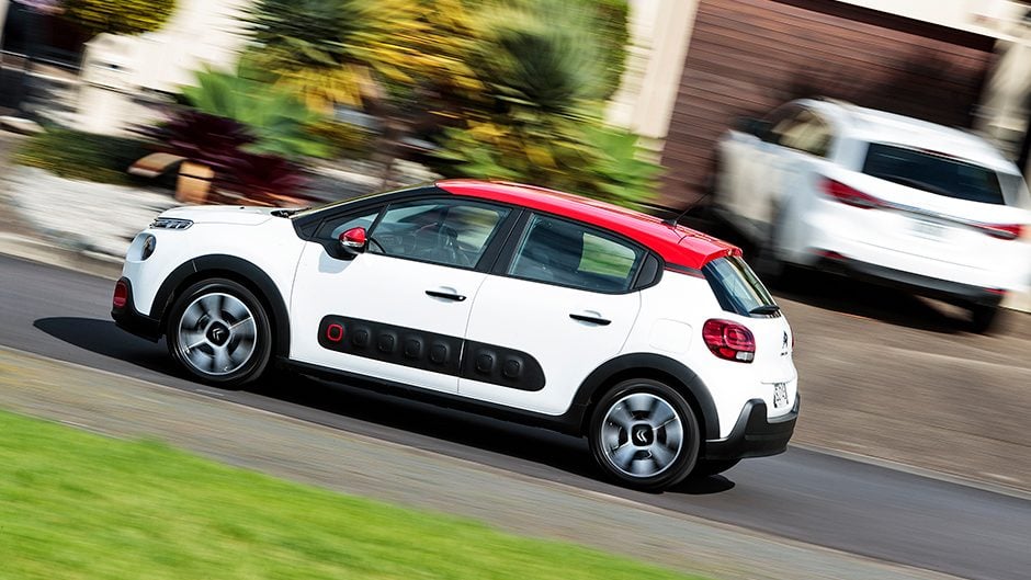 2017 Citroen C3 driving past houses