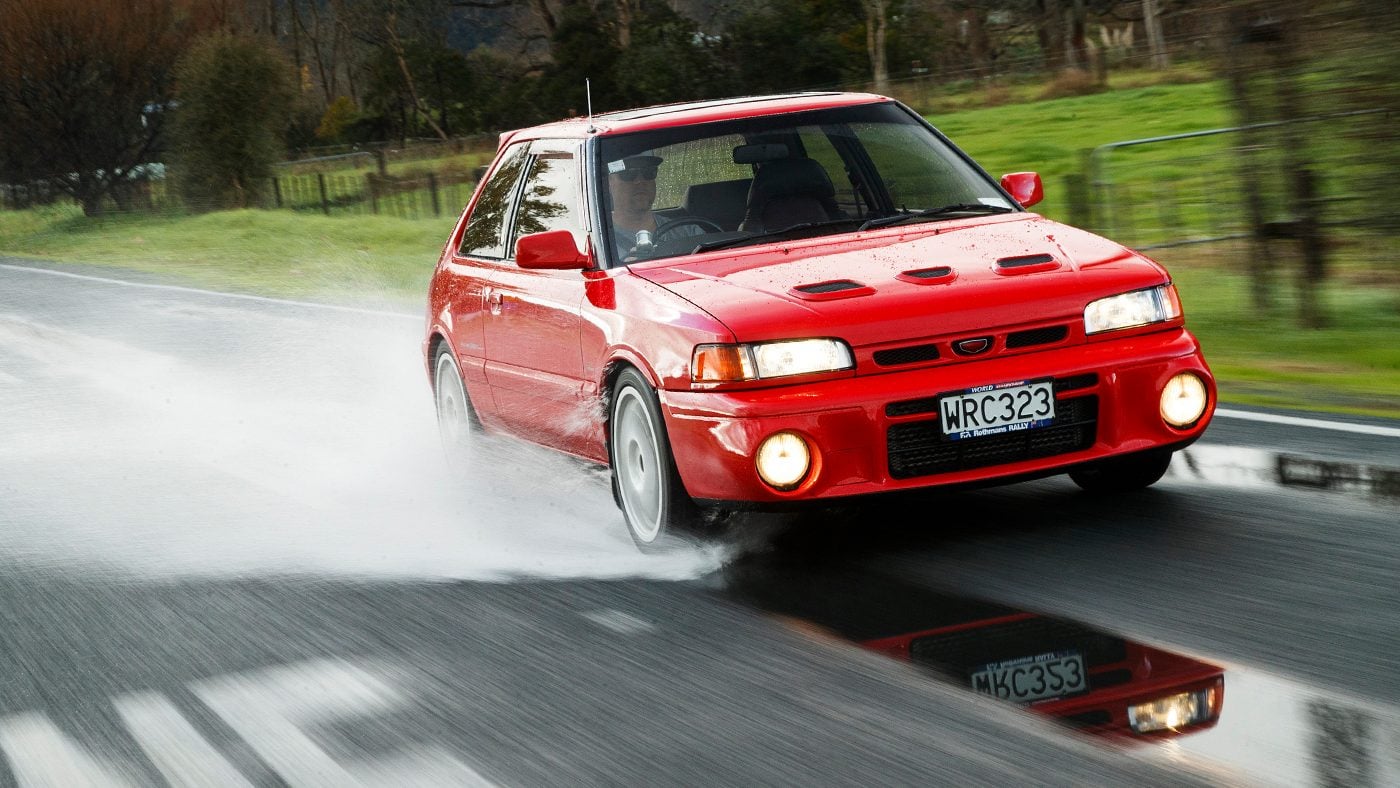 Mazda Familia GT-R on wet road