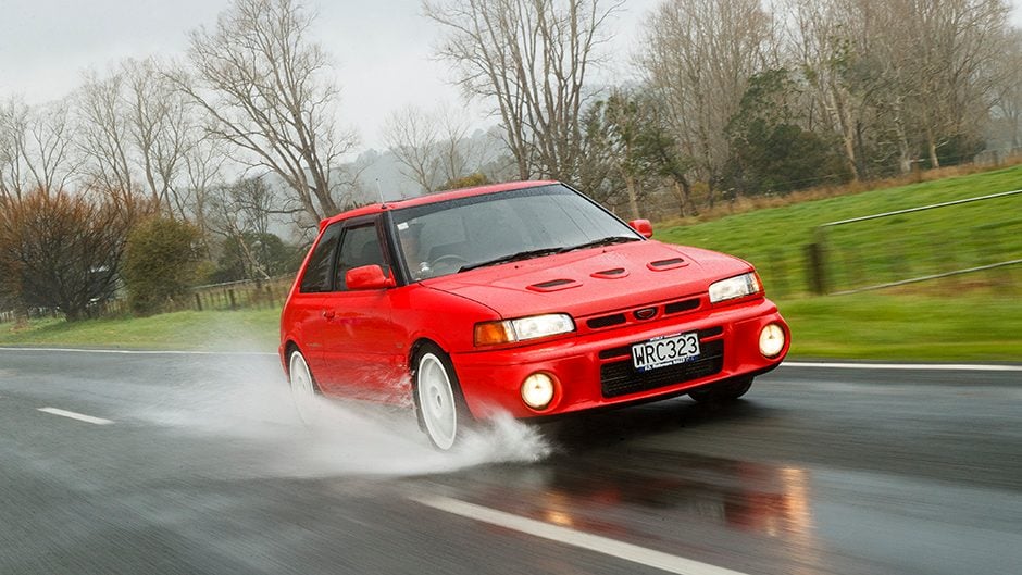 1992 Mazda Familia GT-R driving through water