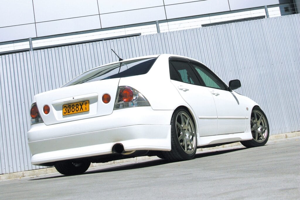 1999 Toyota Altezza RS200 Turbo looking at rear parked in front ofd wall