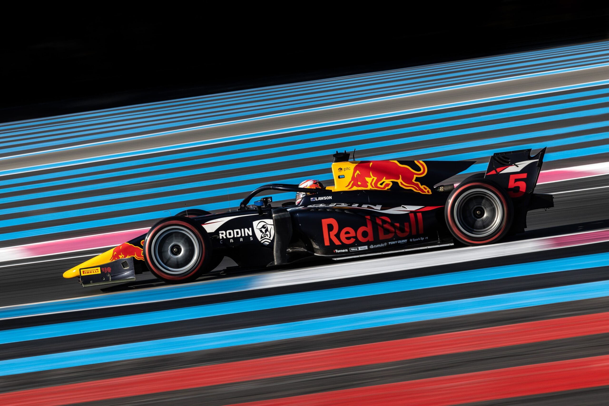 Liam Lawson Formula 2 car racing at Circuit Paul Ricard side