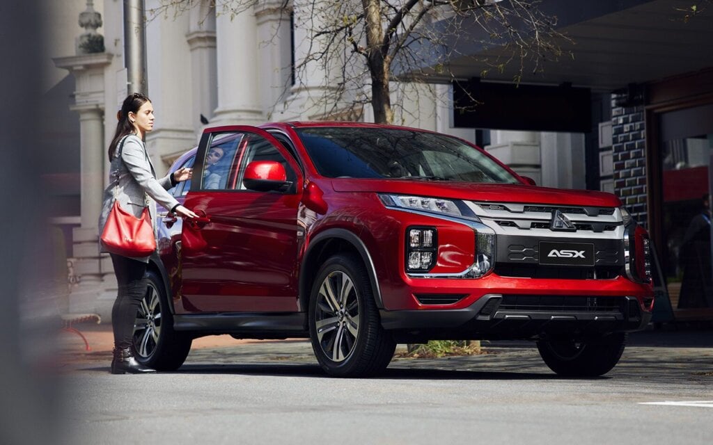 Mitsubishi ASX with lady opening door