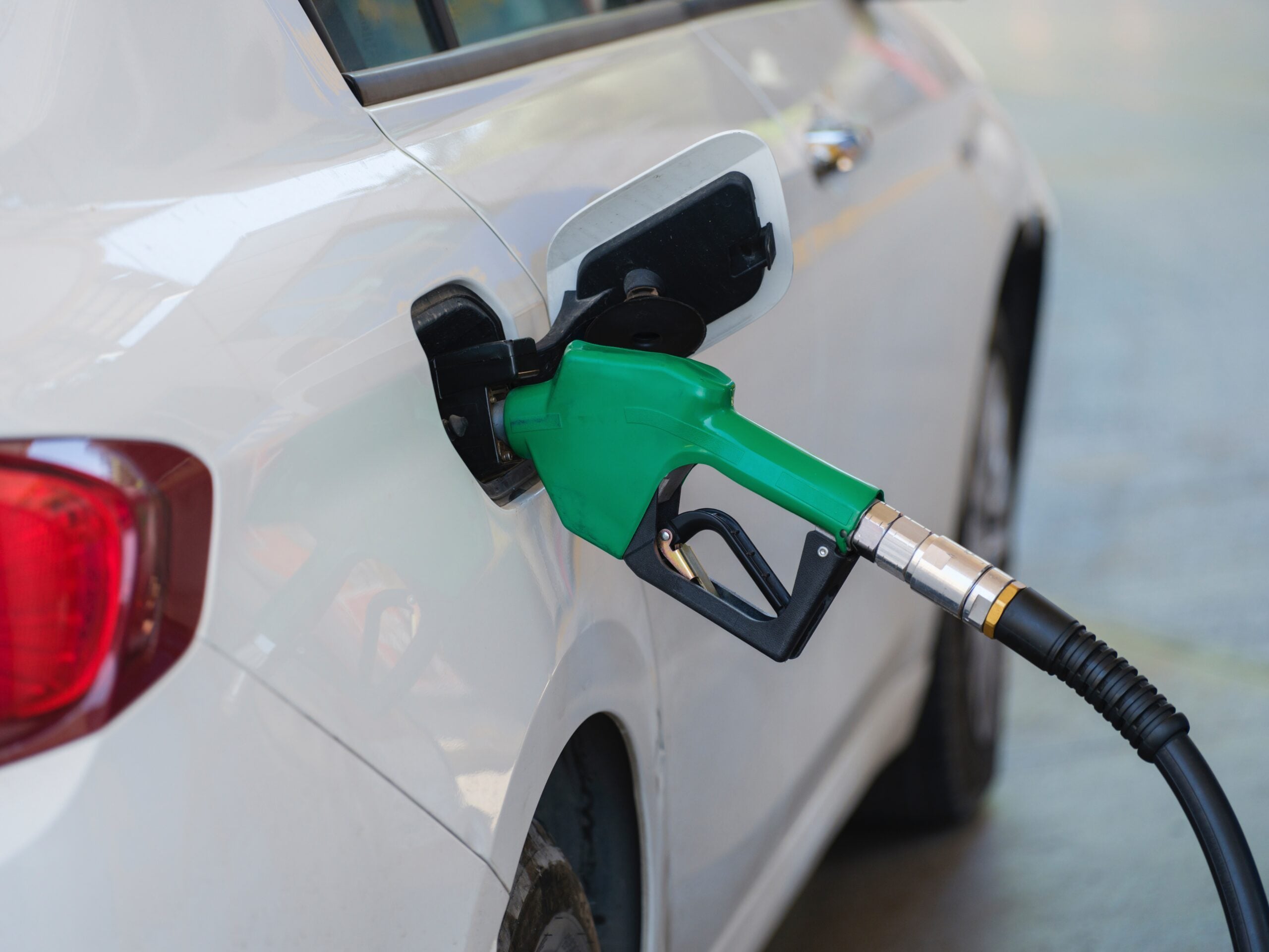 Petrol pump nozzle in car