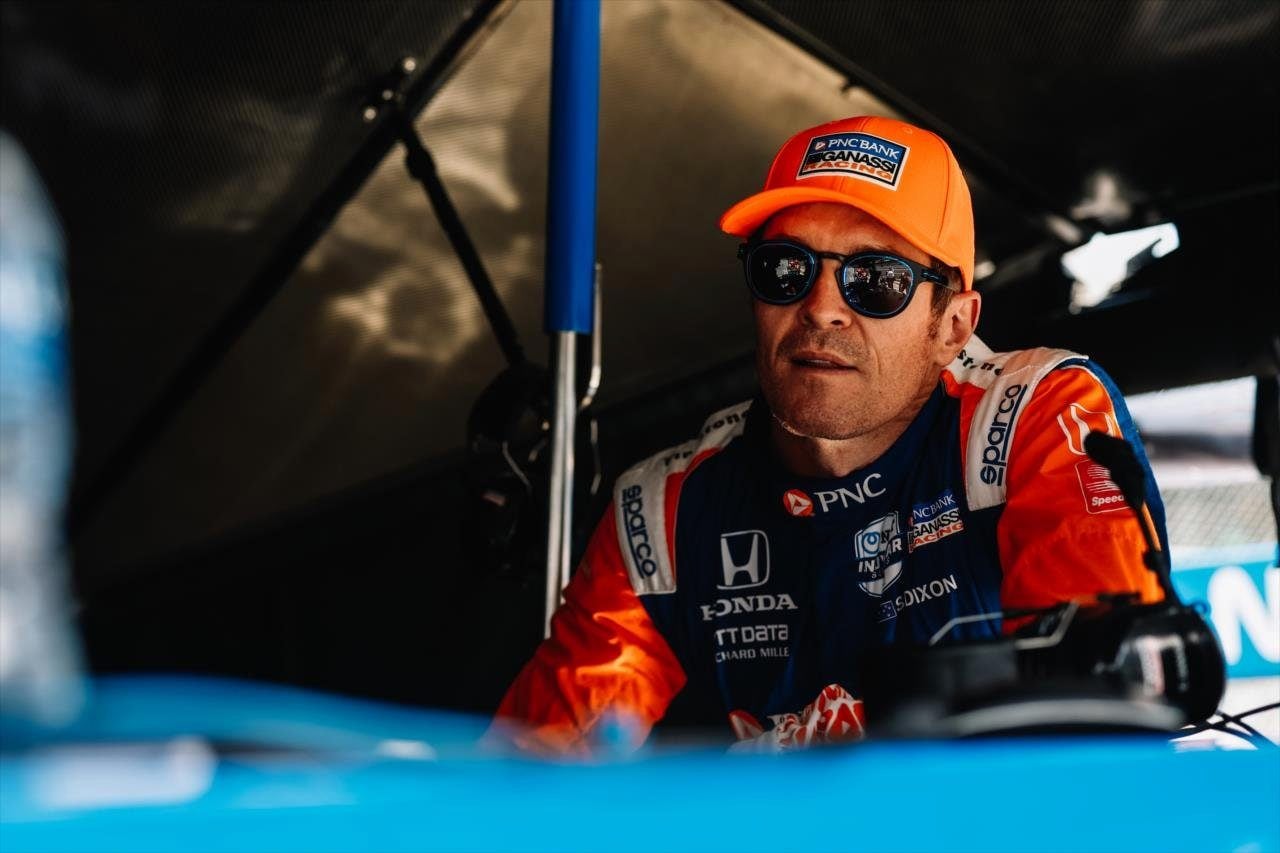 Scott Dixon sitting in shade