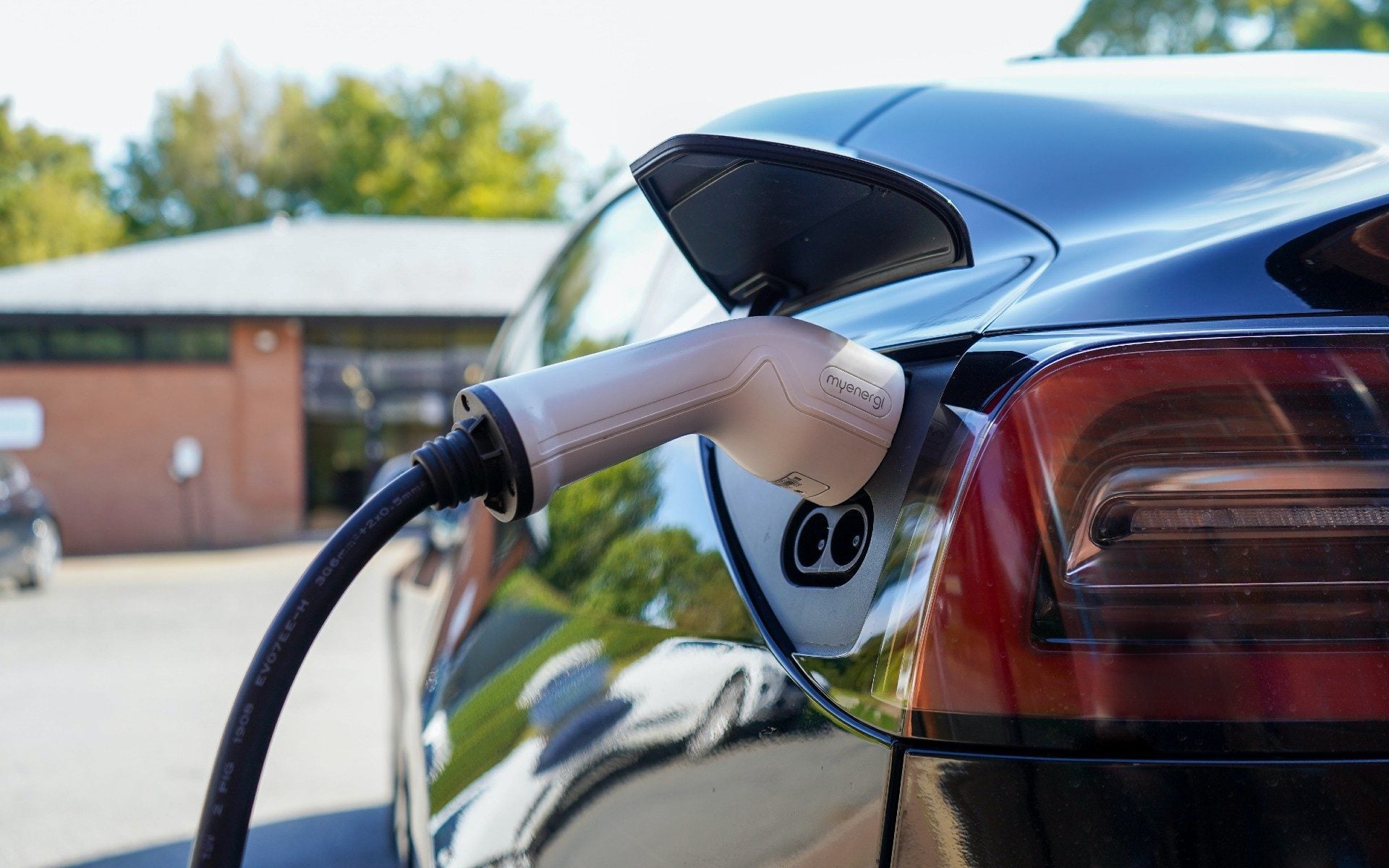 Tesla Model S charging plug close up