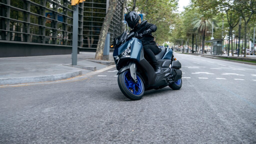 Yamaha Xmax riding around corner