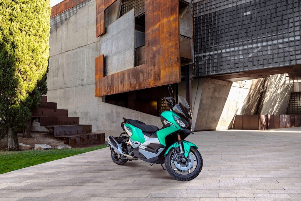 Peugeot XP400 in front of building