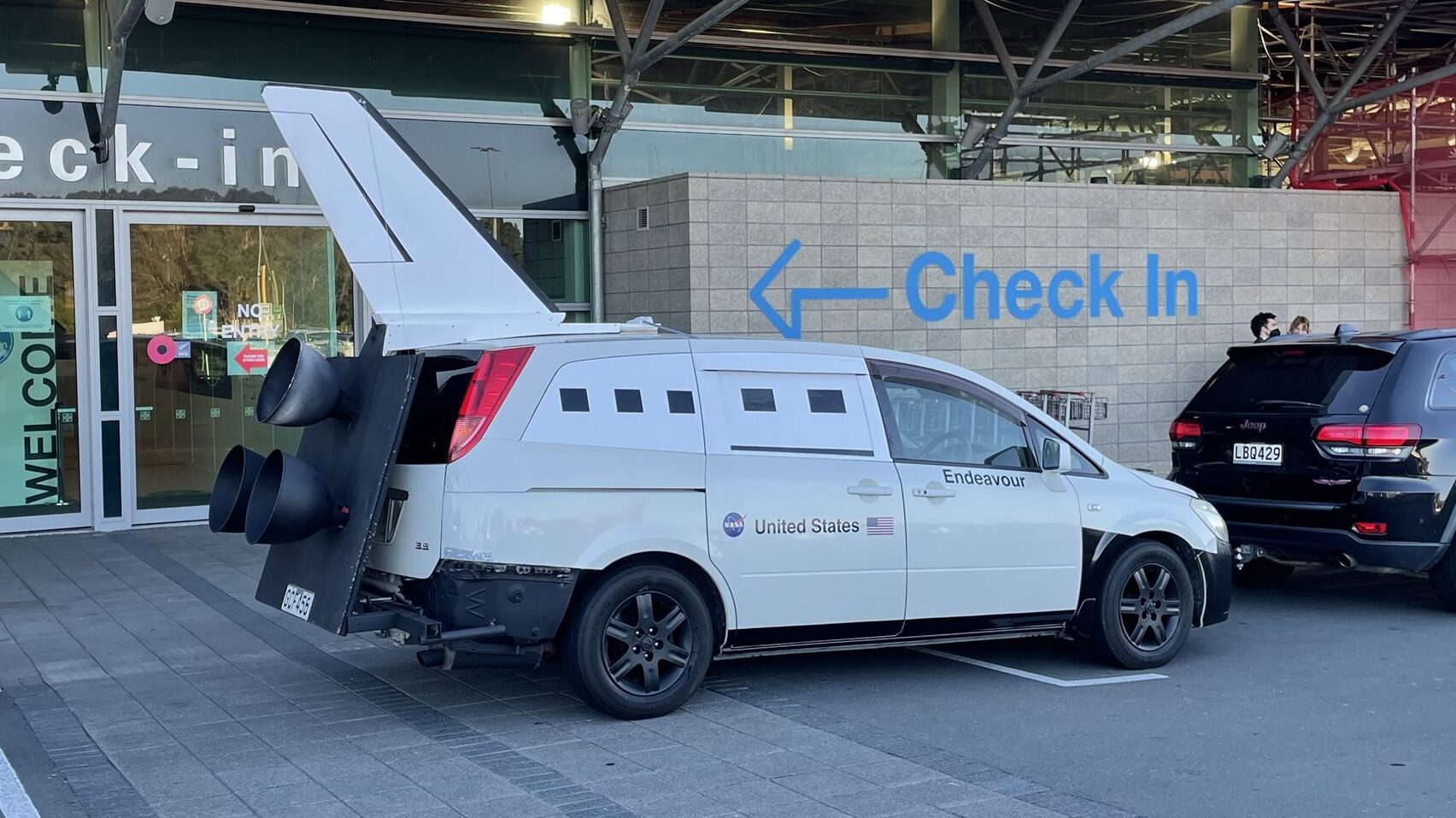 Nissan Presage space shuttle rear three quarter view