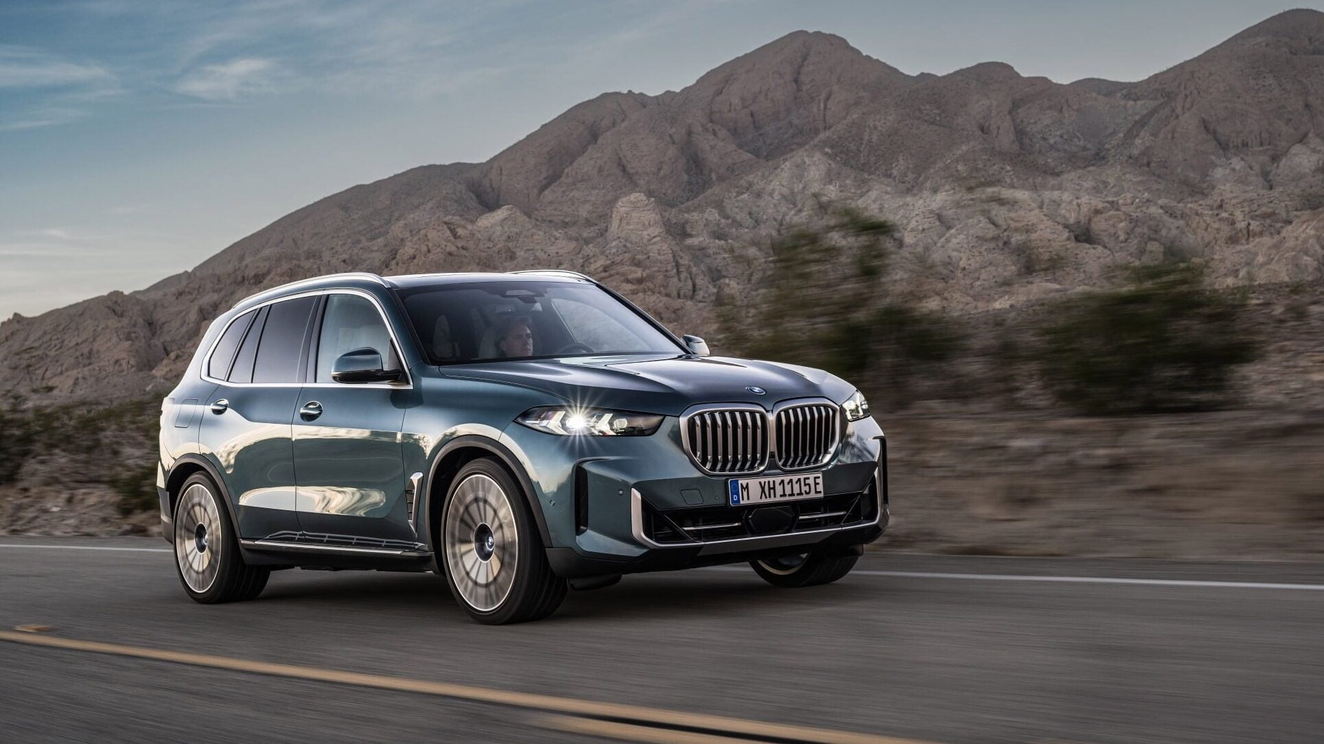 2024 BMW X5 driving in mountains
