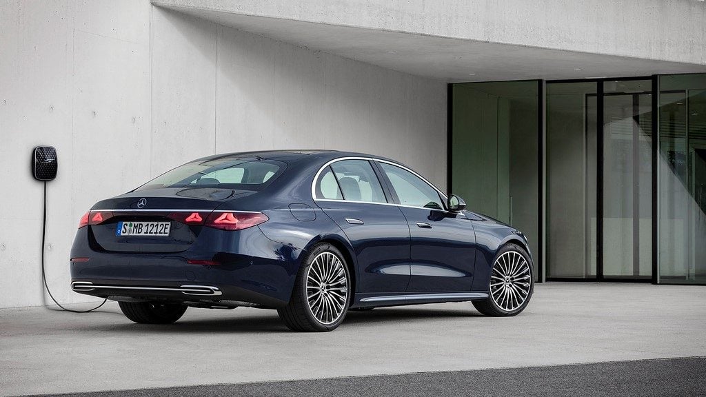 Mercedes-Benz E-Class PHEV charging rear three quarter view