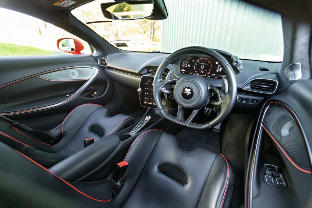 Interior shot of the McLaren Artura, with wheel and seats visible