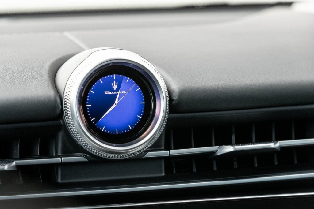 Digital clock screen in the Maserati Grecale Modena