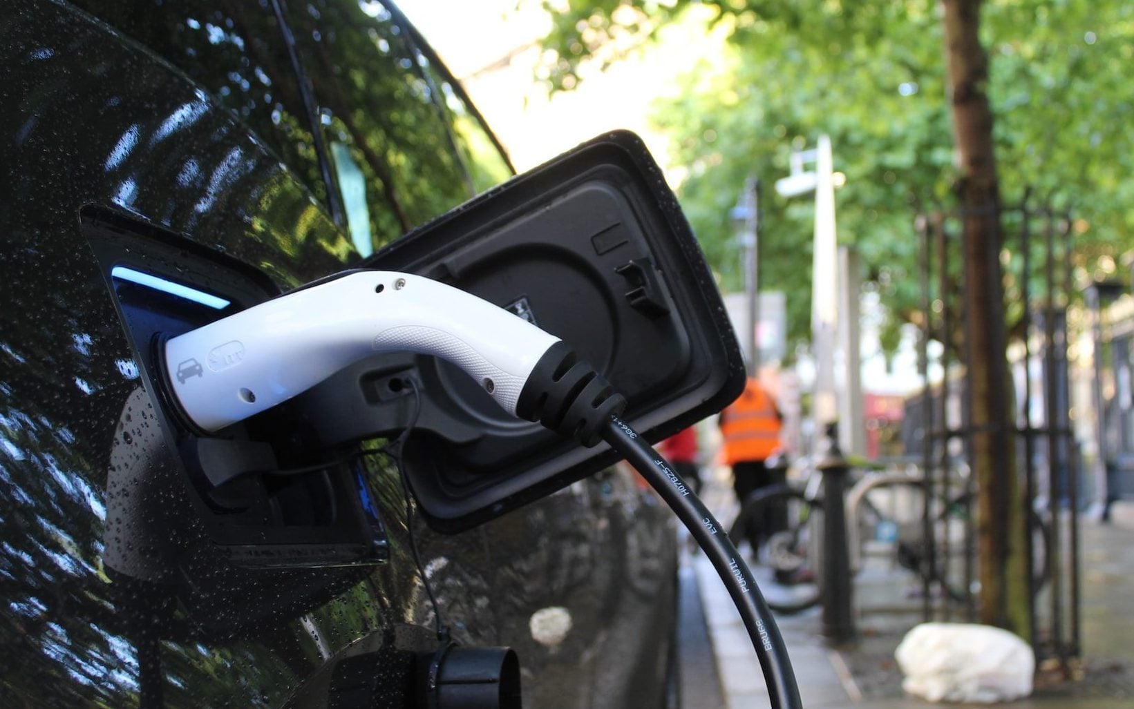 Electric vehicle charging by trees