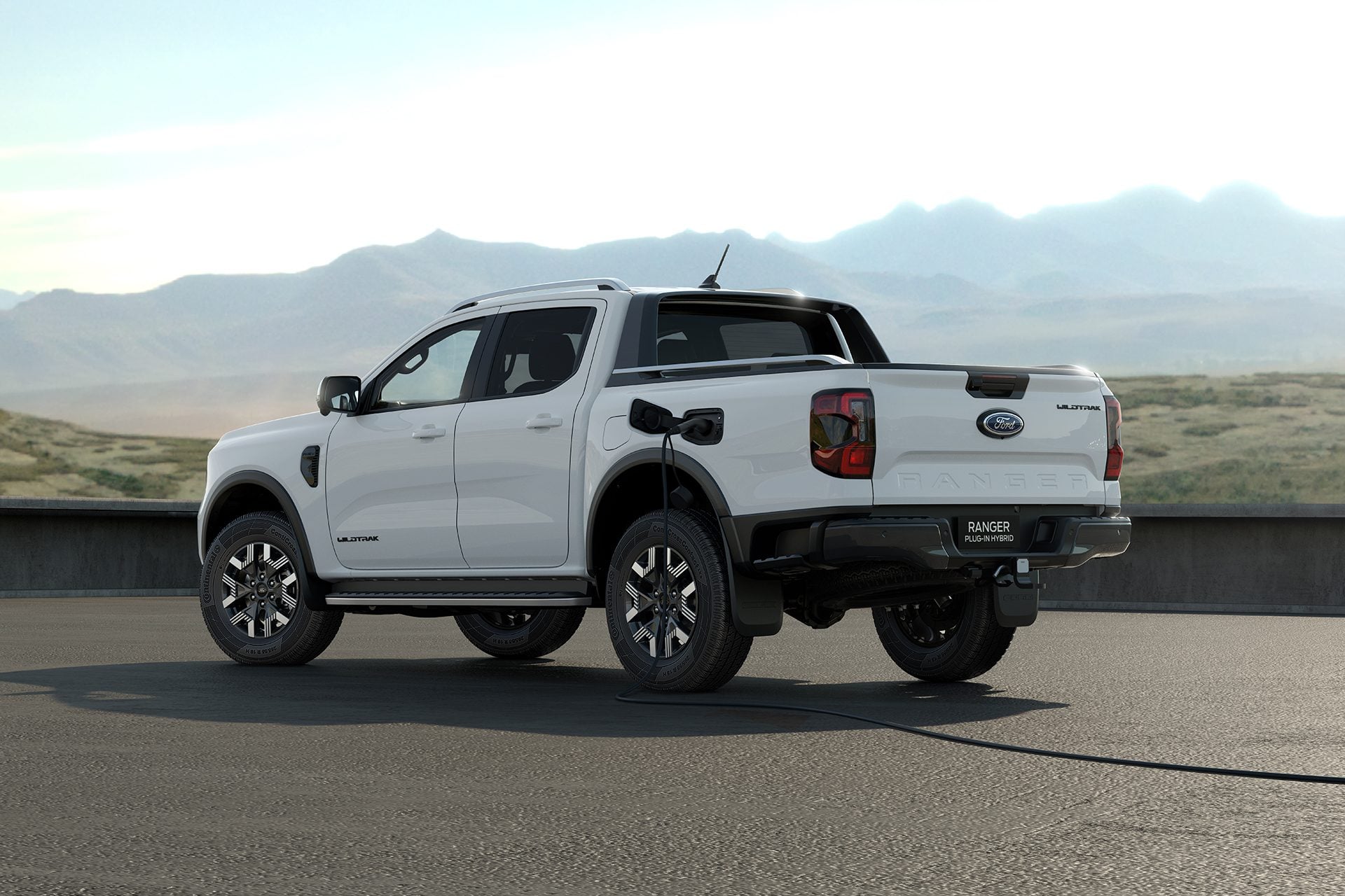 Ford Ranger plug-in hybrid with charging cable plugged in