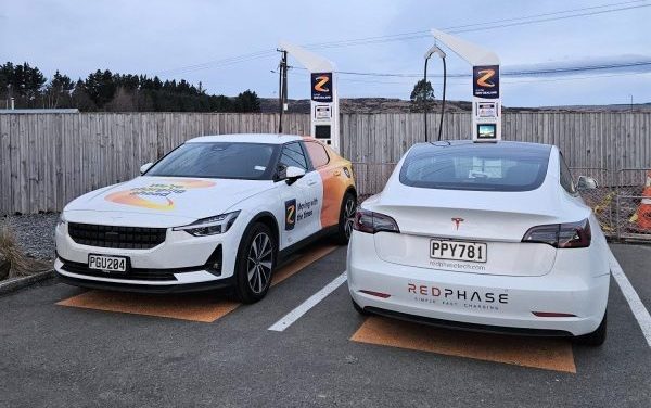Two electric cars charging at Z Energy station