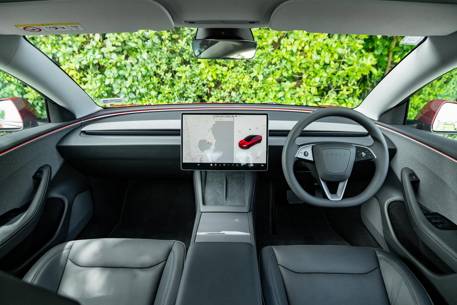 Model 3 cabin in front of bush