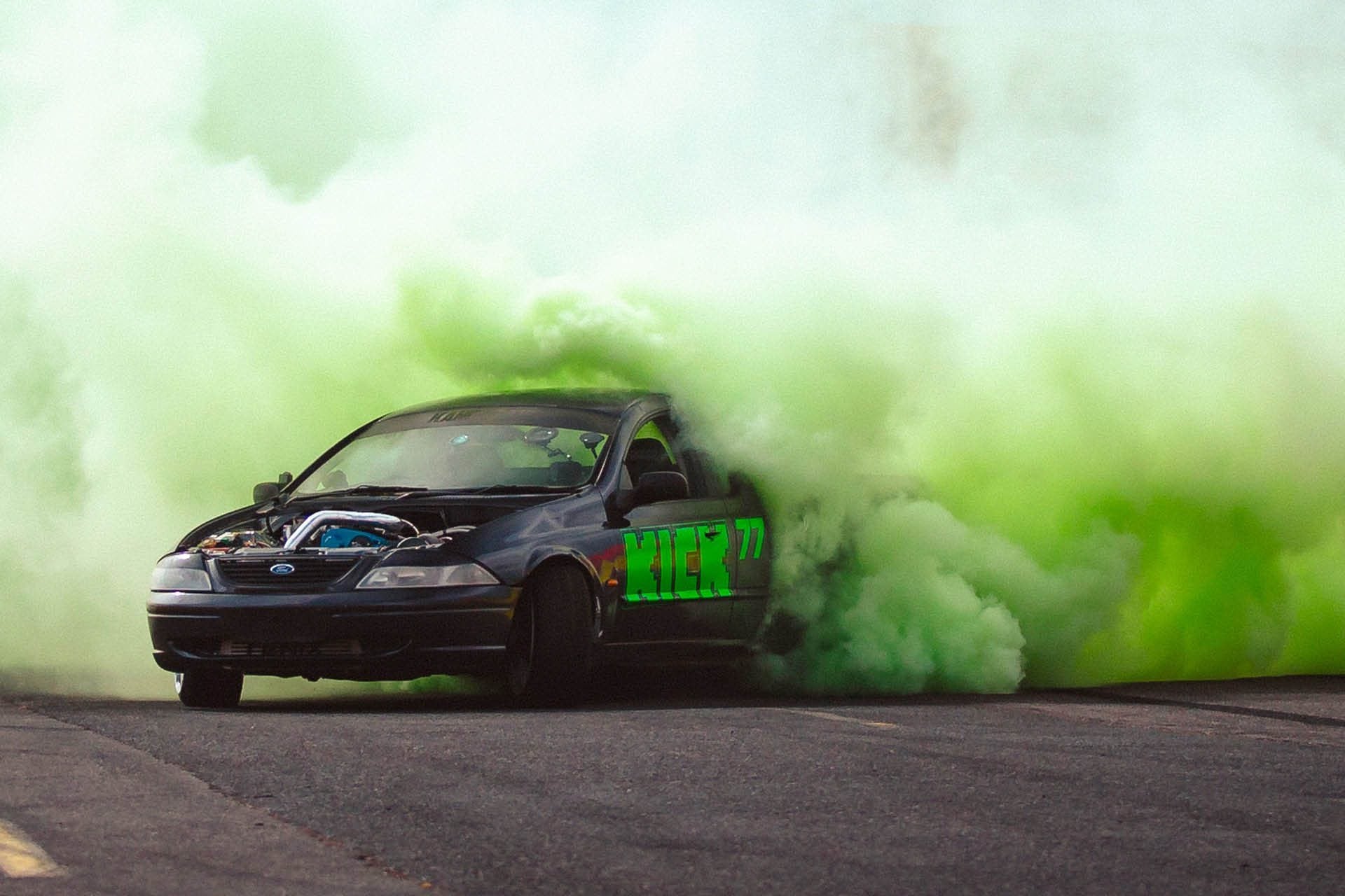 Valtteri Bottas doing a burnout in Ford Falcon (AU) ute