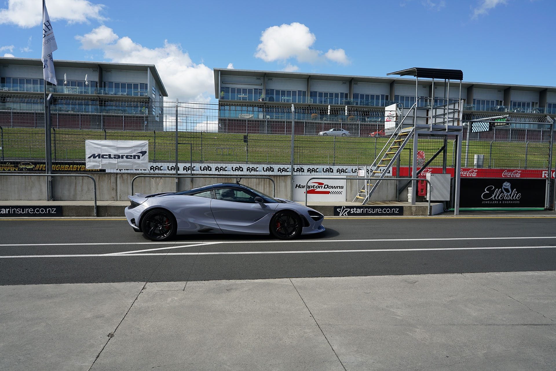 McLaren 750S exiting the pits and primed for action.