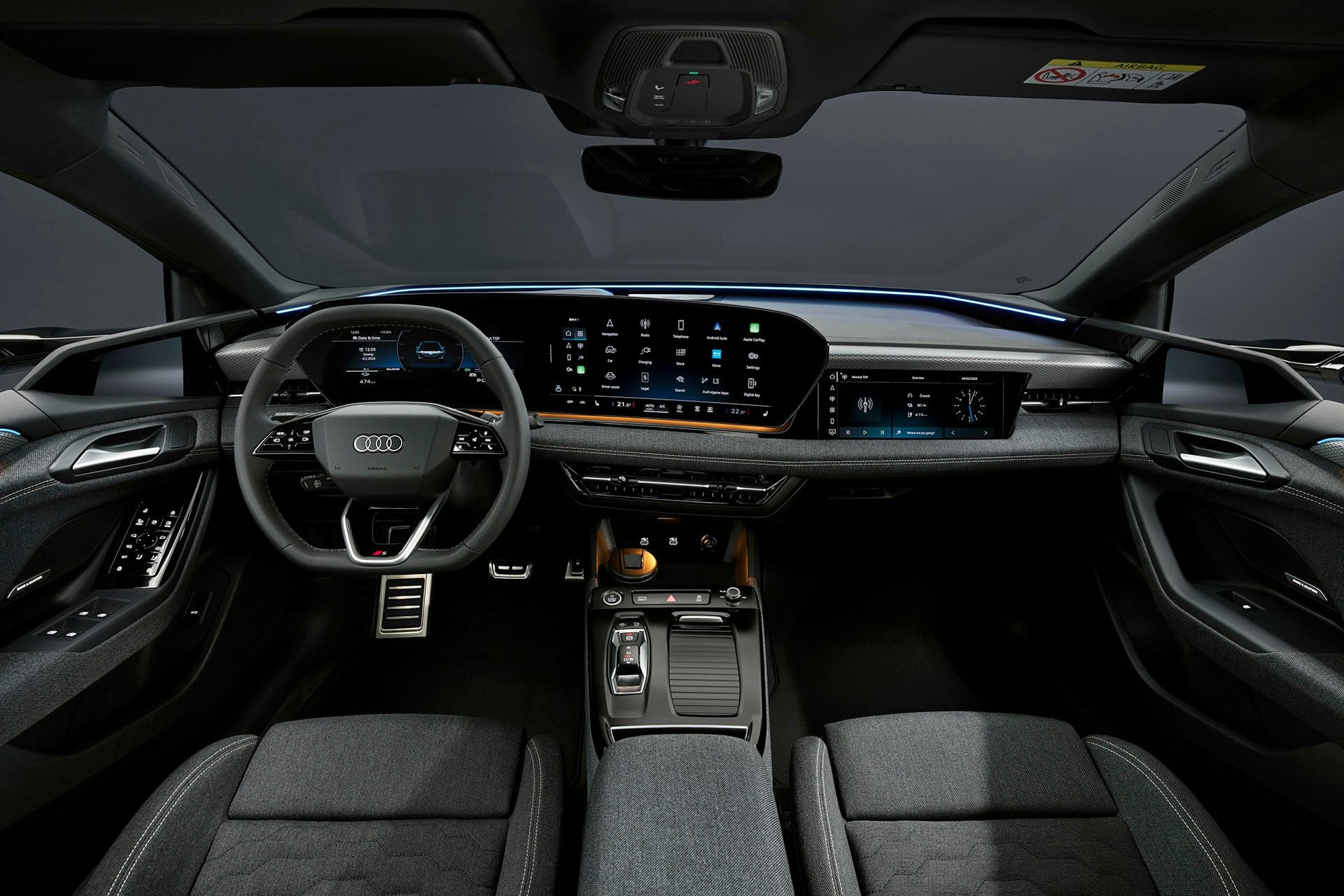 Note the cloth seat finish and optional passenger screen.