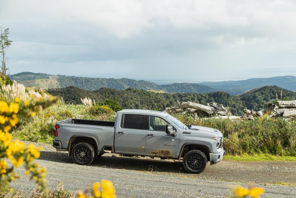 Side profile of the 2024 Chevrolet Silverado 2500 HD LTZ Premium, on a hill
