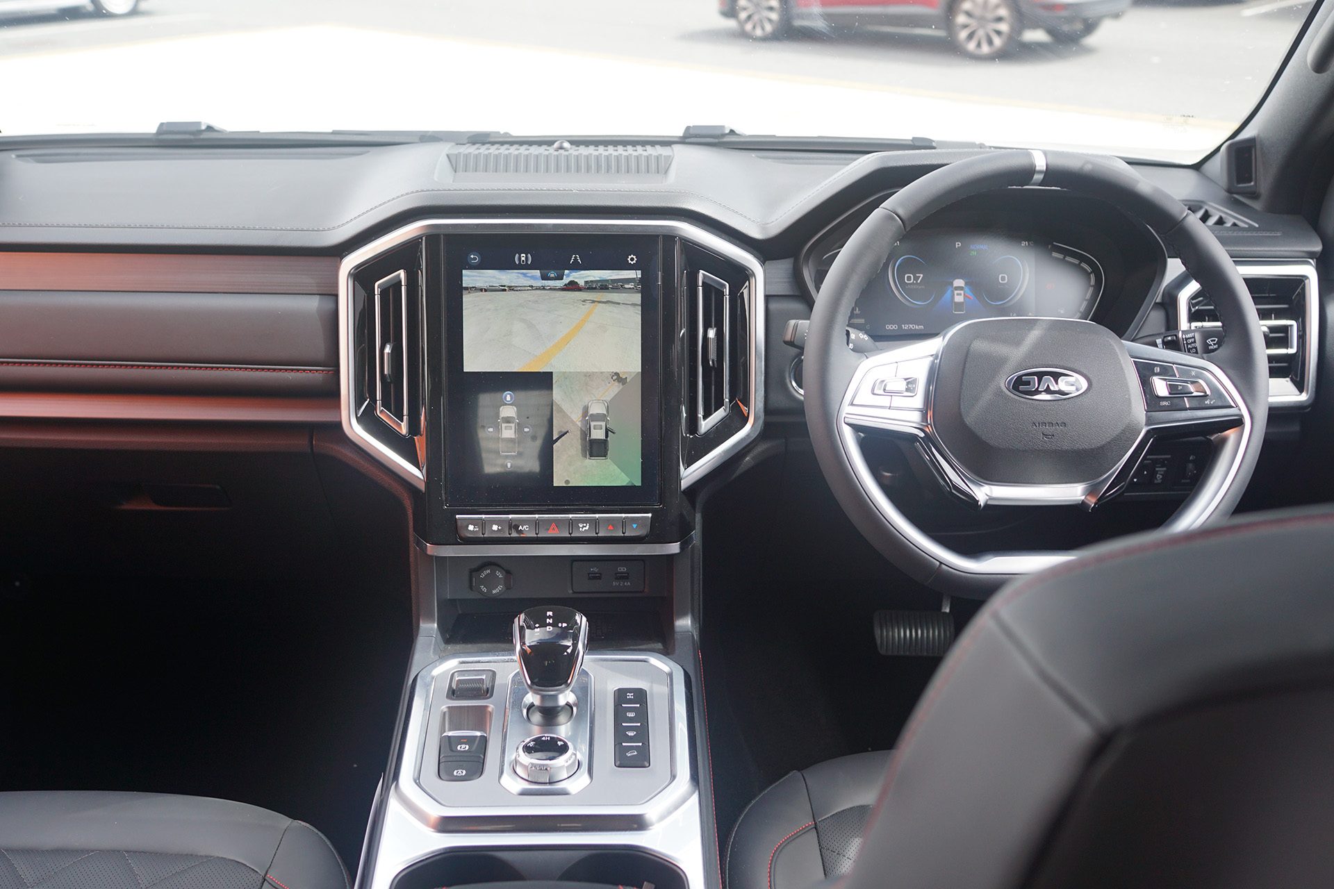Interior feels a little dated but everything works fine, with plenty of actual buttons.