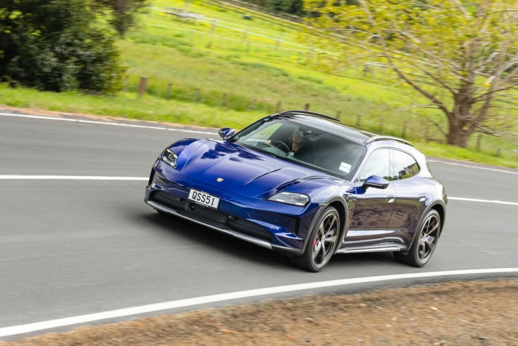 Porsche Taycan 4S Cross Turismo shooting brake, taking a corner at pace