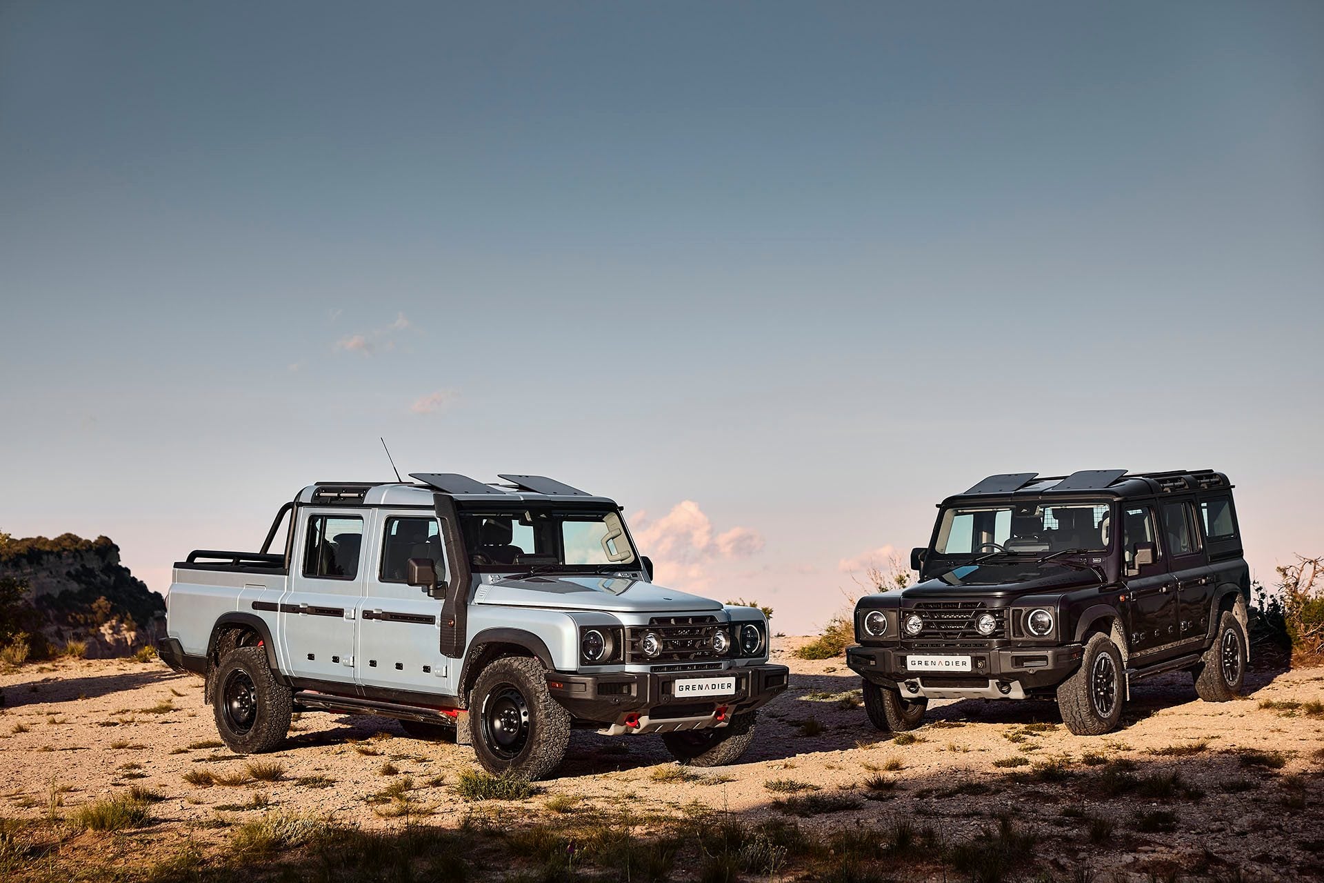 More Grenadiers parked on an off-road area.