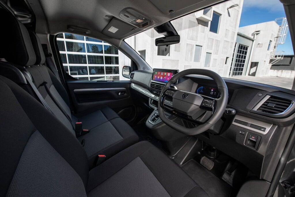 2023 Peugeot e-Partner Long cab showing three seats in the front