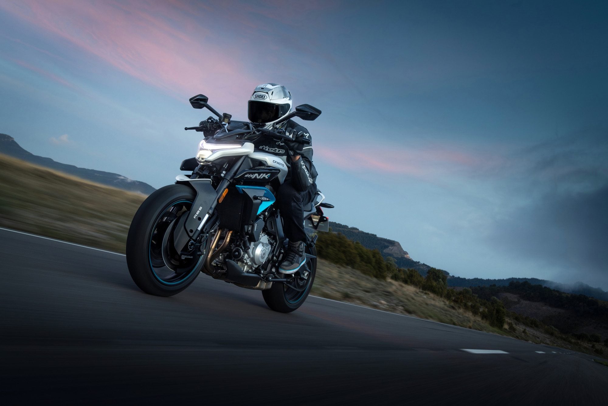 Aggressive headlight and riding position for a naked bike.