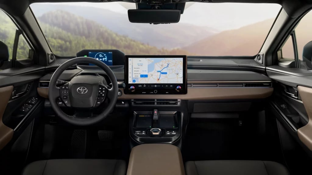Pretty typical EV interior with dominating central screen and a few buttons down lower.