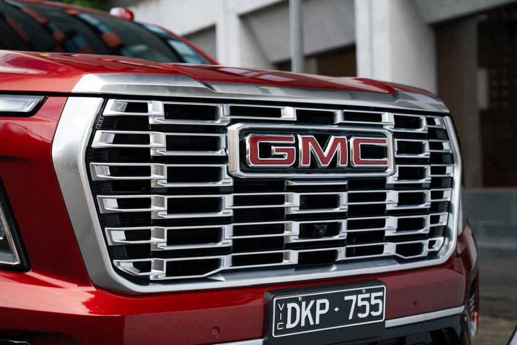 The GMC badge lights up at night.