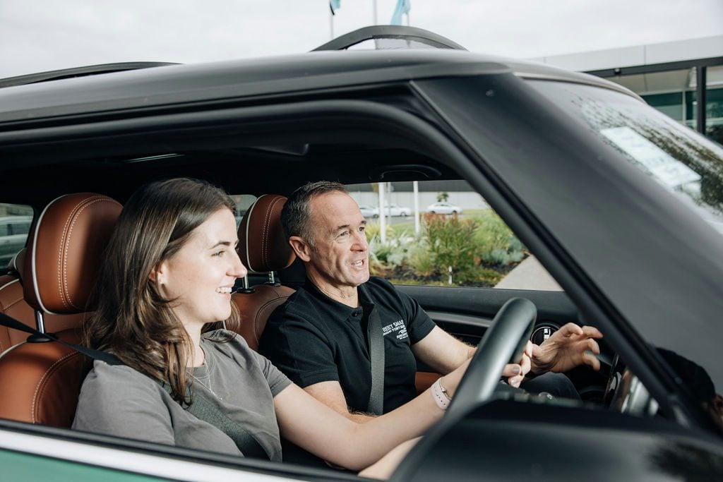 Greg Murphy advises budding driver.