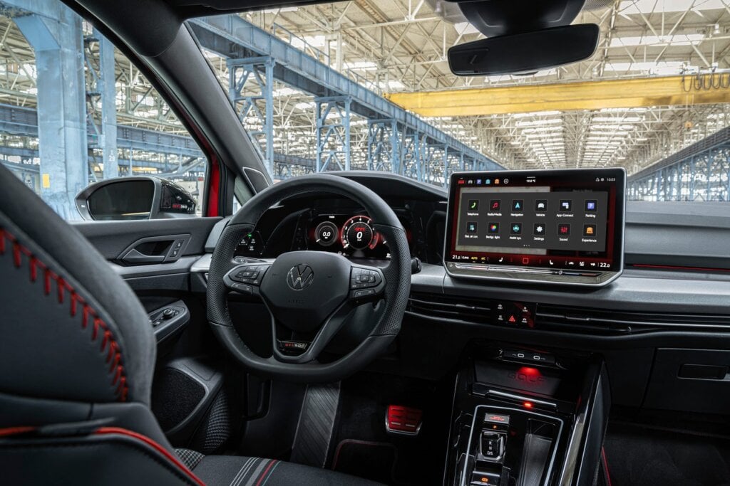 Serious inside too with sports pedals, returned steering, and new tartan for the seat coverings.