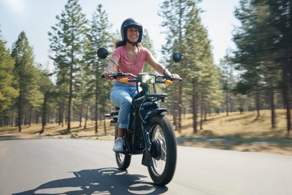 Woman enjoying an UBCO ride.