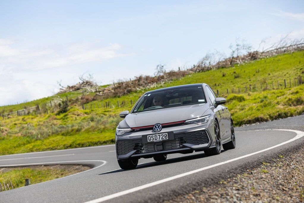 A Volkswagen Golf GTI doing its thing on the open road.