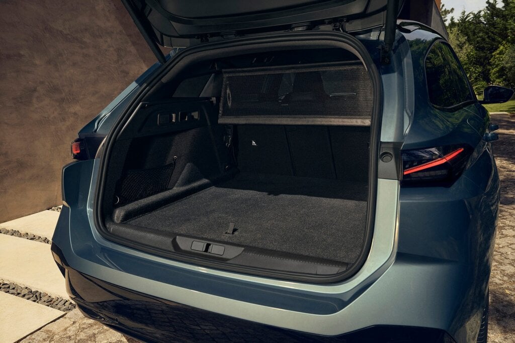 Estate offers a bit more space in the back than hatch, only a bit mind.