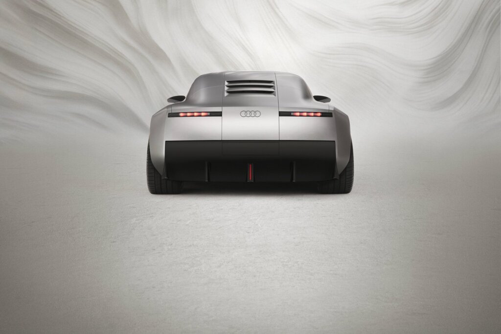 Rear remind slightly of upcoming Jaguar GT, without a screen of any sort.