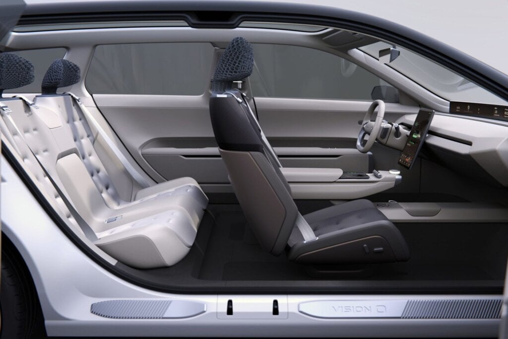 The interior without doors shows vast legroom both front and rear.