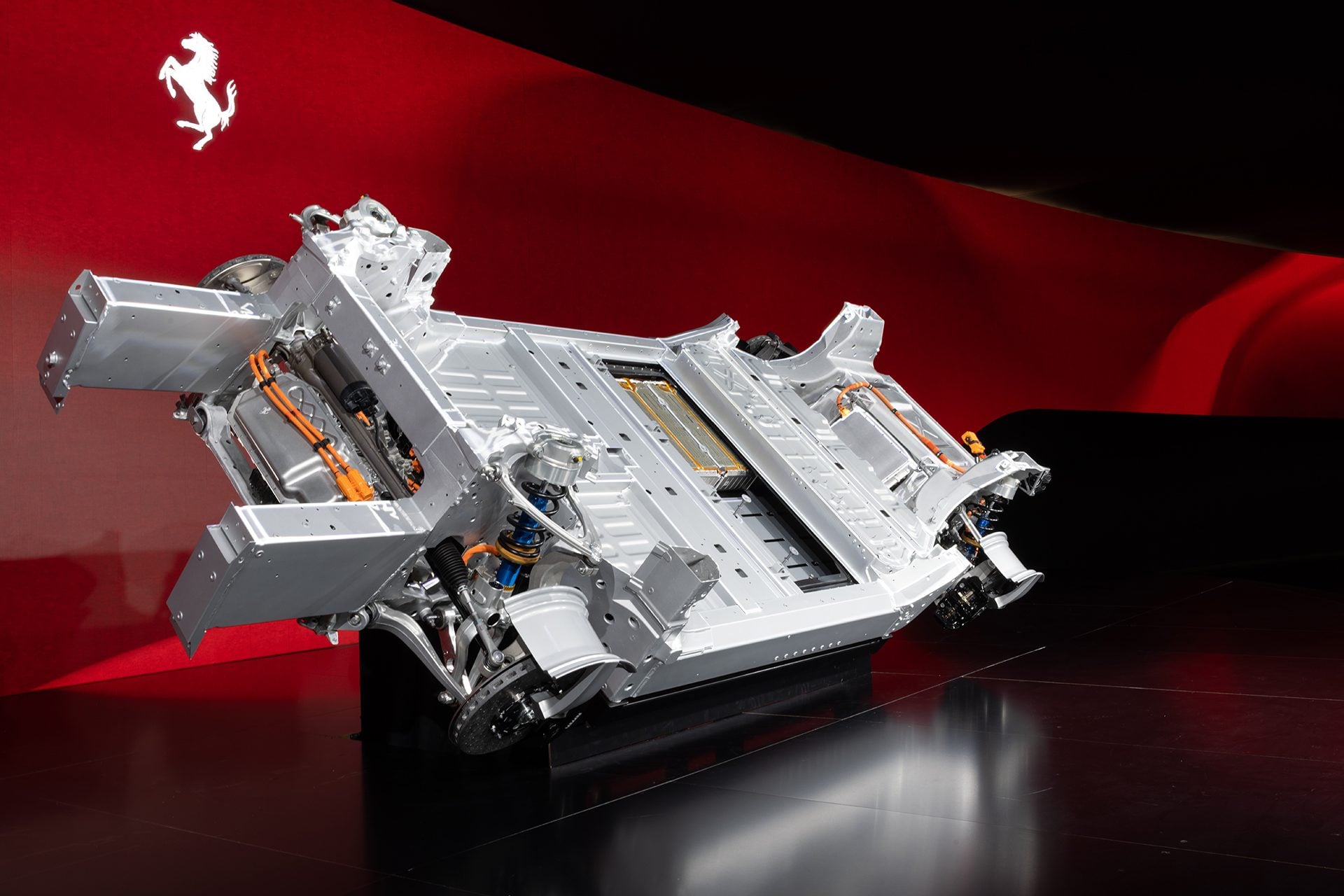 Ferrari EV platform against a bed backdrop