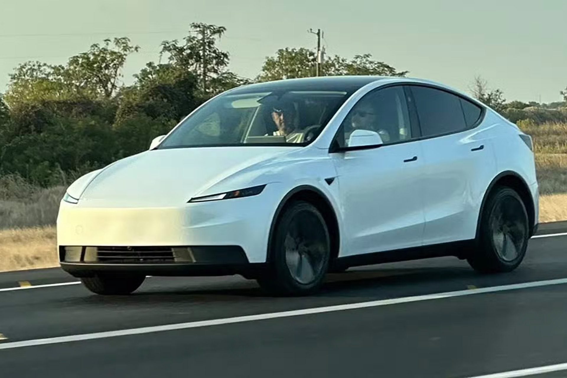 2025 Tesla Model Y RWD in white on tarmac
