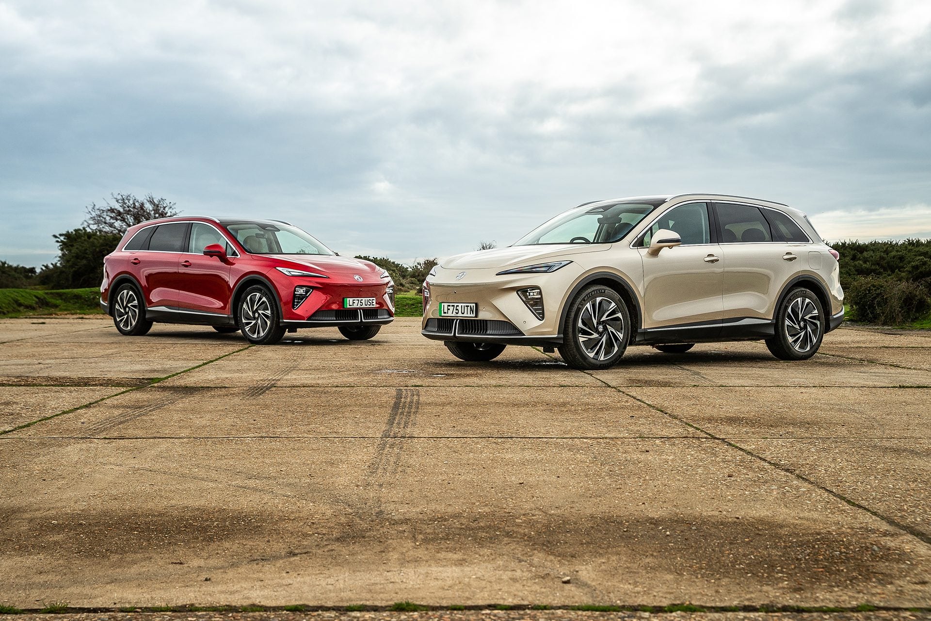 Two MGS6 models in red and gold