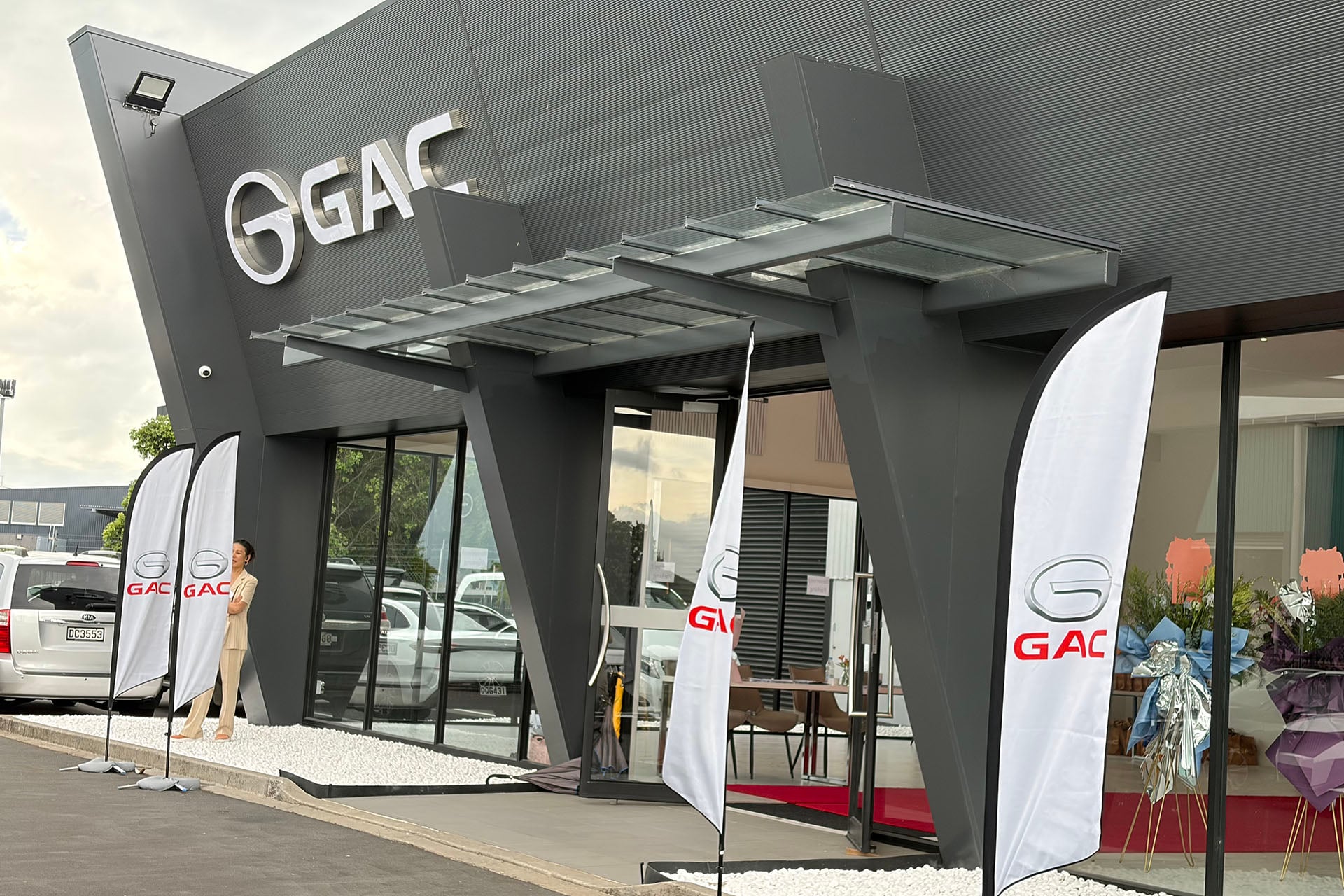 A GAC dealership in grey