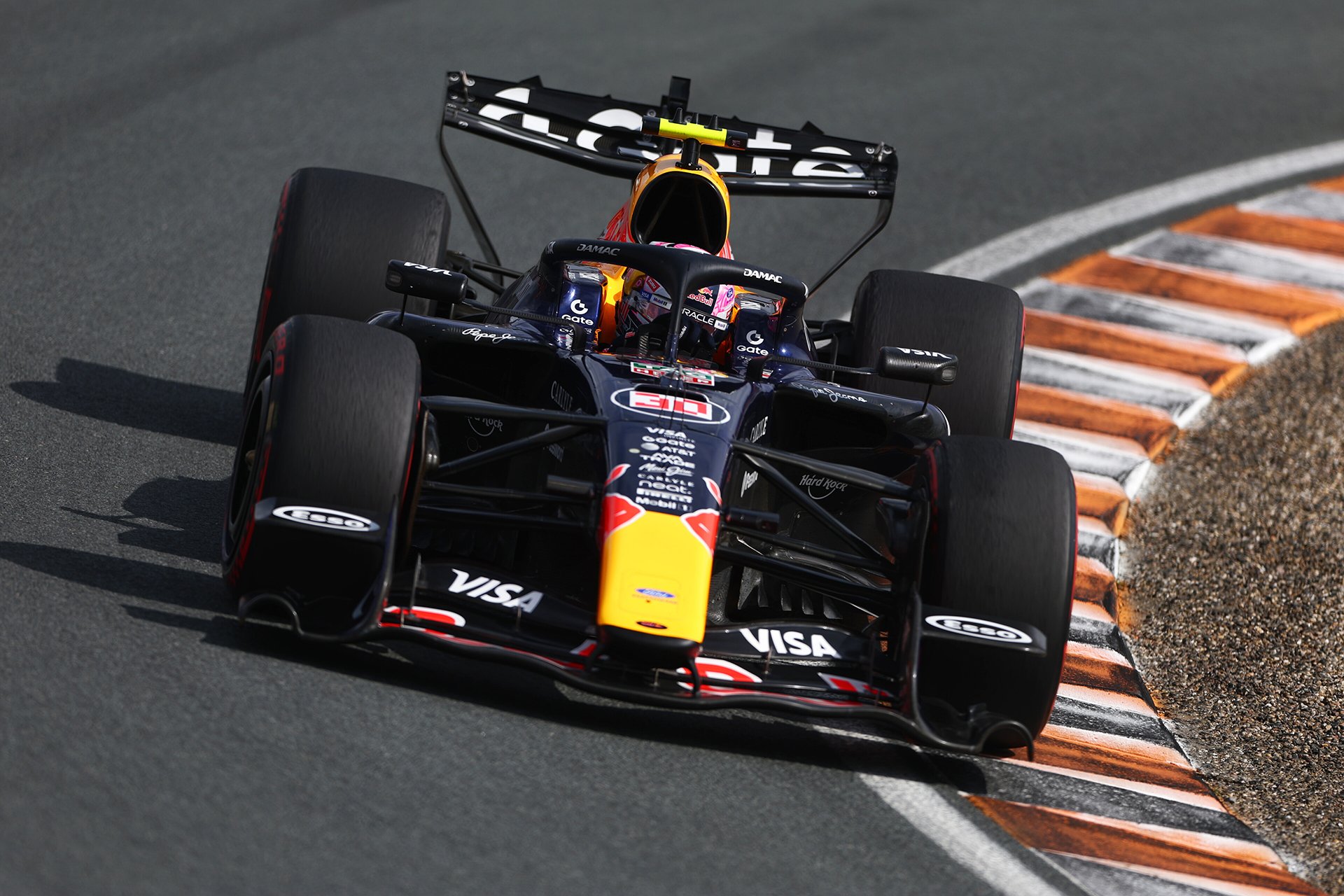 Lawson of New. Zealand driving the (30) blue Oracle Red Bull Racing RB22